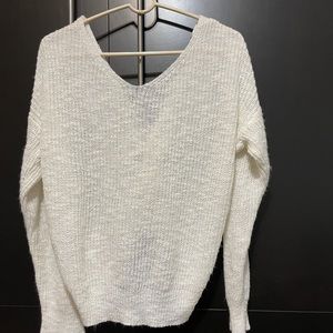 White blouse with twist tie in the back